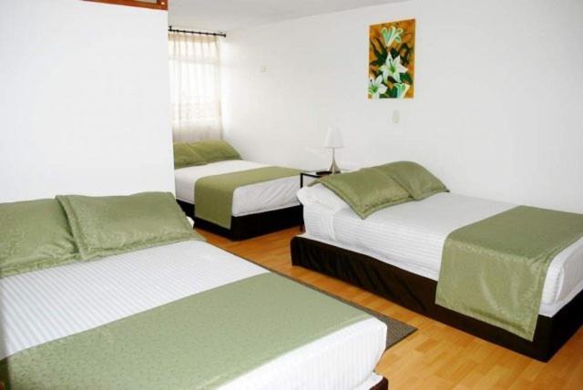 Hotel Portal De Milán Manizales Habitación foto